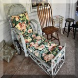 F70. Antique painted wicker lounge chair. - $130 